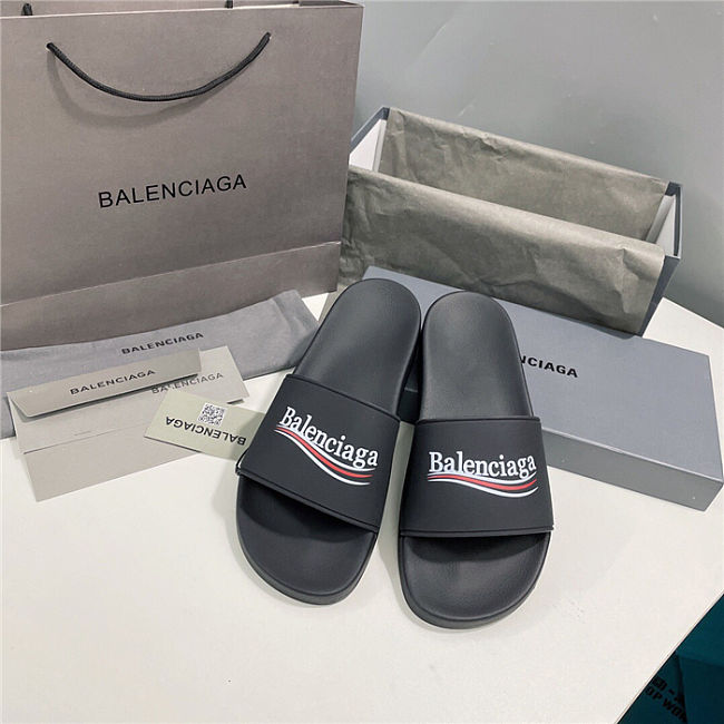 BALENCIAGA Black Logo Wavy Pool Slides - 1