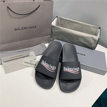 BALENCIAGA Black Logo Wavy Pool Slides