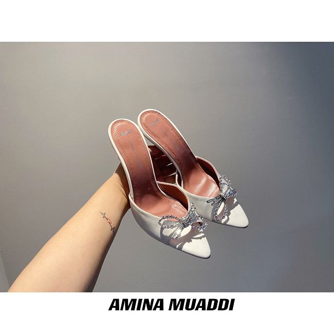 Amina Muaddi White Peplum Sling Heels - 1